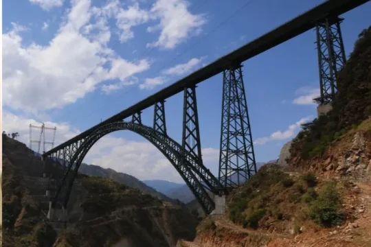 Serene landscape with misty mountains and a lak