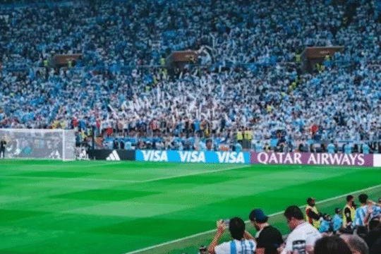 Brazilian football players celebrating a goal during the 2026 FIFA World Cup Qualifier match against Paraguay.