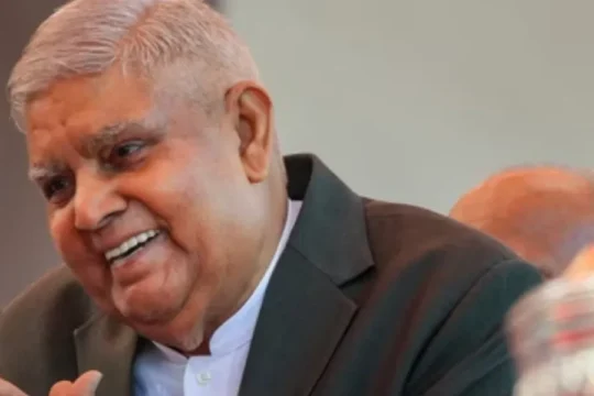 Jagdeep Dhankhar, India's Vice President, smiling and holding his hands together.