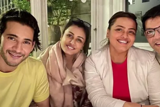 Mahesh Babu and Namrata Shirodkar with two friends smiling at a restaurant table.