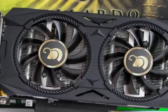 Close-up of a black graphics card with two fans on its packaging.
