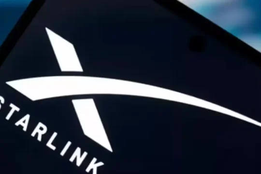 Close-up of a smartphone screen displaying the white Starlink logo.