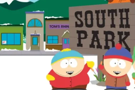 South Park characters Cartman, Stan, Kyle, and Kenny next to a sign.