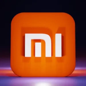A glowing 3D Xiaomi (Mi) logo on a dark, reflective surface.