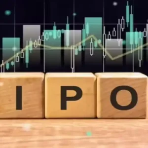 Wooden blocks spelling "IPO" on a table with a glowing stock market graph overlay