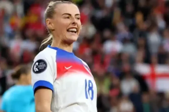 Chloe Kelly of England celebrates during a football match
