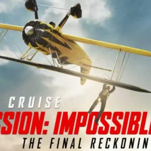 Movie poster for "Tom Cruise Mission: Impossible - The Final Reckoning" featuring a biplane with a person hanging from it