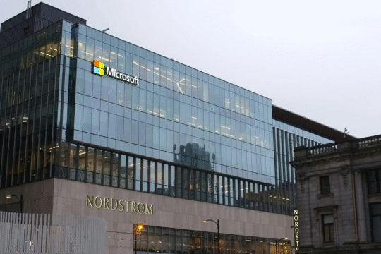 The Microsoft and Nordstrom logos are visible on a modern glass building.