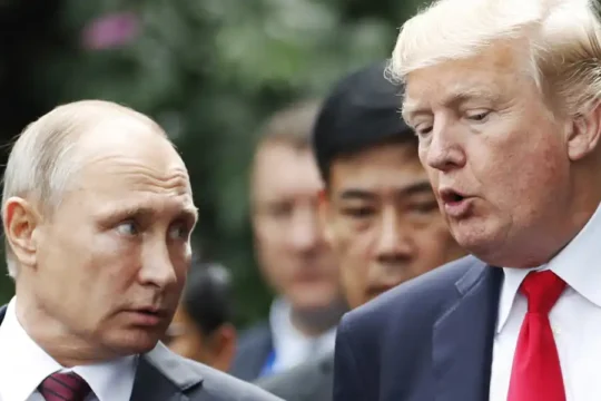 Russian President Vladimir Putin and President Donald Trump in conversation.