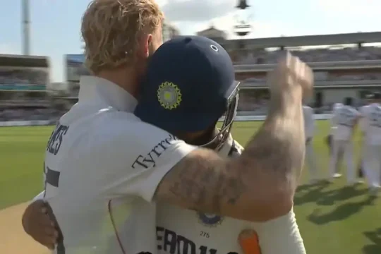 English cricketer Ben Stokes embraces Ravindra Jadeja on the field.