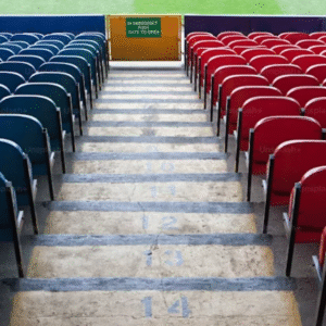 "Close-up of a red cricket ball with stitched seam on a dark background, symbolizing intense match action in MLC 2025."