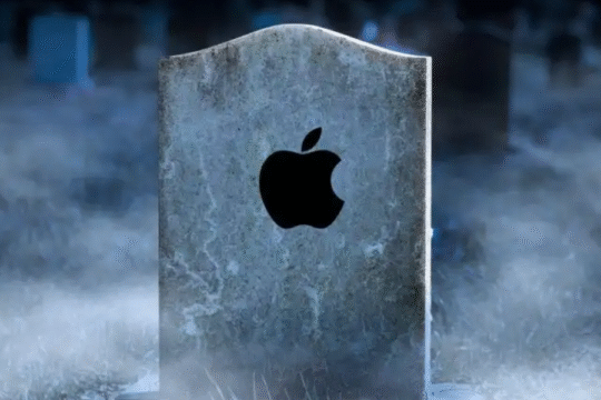 A tombstone in a misty graveyard with the Apple logo engraved on it, symbolizing the end or decline of Apple.
