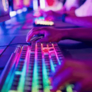 Gamers playing on RGB mechanical keyboards in a neon-lit gaming arena