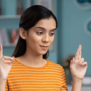 Young Indian woman crossing fingers with hopeful expression during online result check at home.