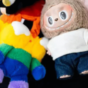 A close-up of colorful stuffed dolls, including a faux Labubu doll, hanging from a black handbag.