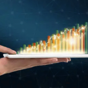 Hand holding a tablet displaying colorful 3D bar graph rising upwards