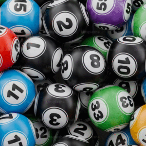 A full-frame, overhead shot of a large pile of colorful bingo balls.