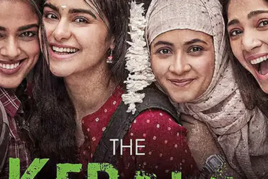 Four smiling women from the movie poster for 'The Kerala Story'.