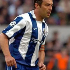 Portuguese soccer player jorge costa in a blue and white striped FC Porto jersey.
