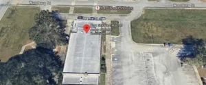 A satellite map view showing a building and a parking lot at Fort Stewart-Hunter Army Airfield.
