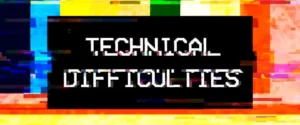 A colorful, glitchy screen with a black box containing the text "TECHNICAL DIFFICULTIES."